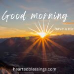 Good morning blessings sunrise image with have a nice day message over mountain landscape with golden sun rays and peaceful dawn sky